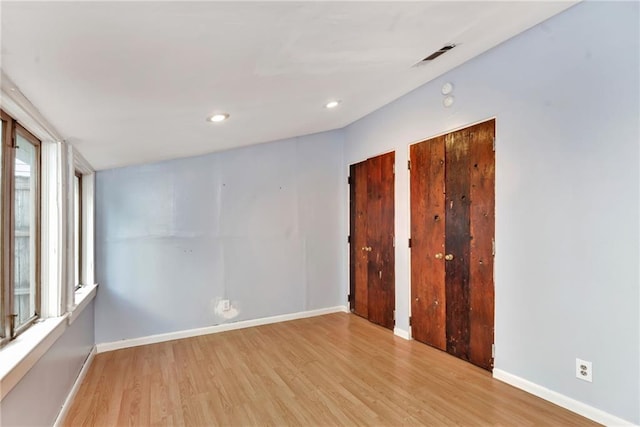 empty room with light wood-type flooring