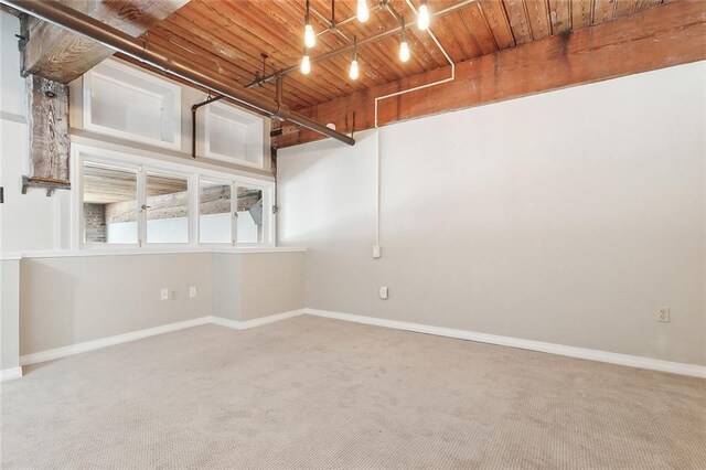 unfurnished room featuring carpet flooring