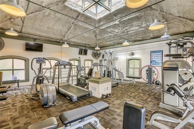 exercise room featuring carpet flooring