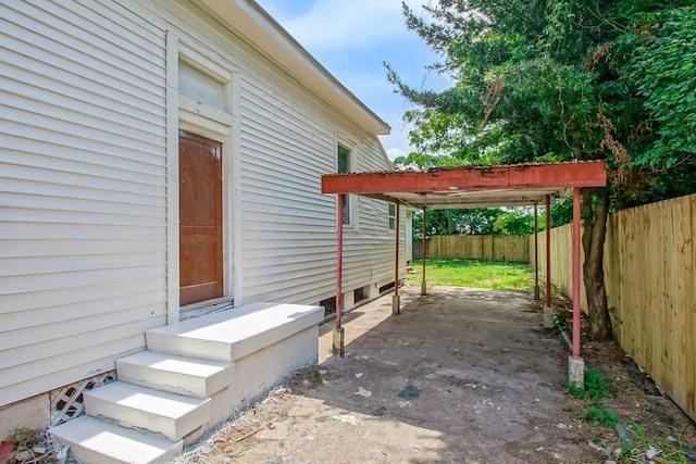 view of property exterior featuring a patio