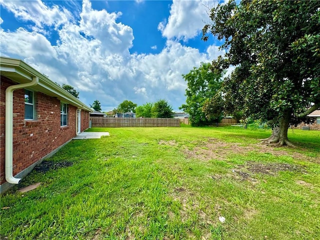 view of yard featuring fence