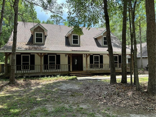 109 Lefleur Dr, Slidell, LA 70460 - cape cod home featuring a porch and a shingled roof
