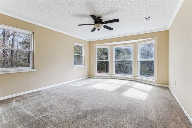 109 Lefleur Dr, Slidell, LA 70460 - carpeted empty room with ornamental molding, ceiling fan, and a textured ceiling
