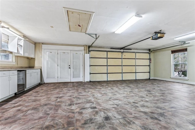 109 Lefleur Dr, Slidell, LA 70460 - garage with a garage door opener and wine cooler