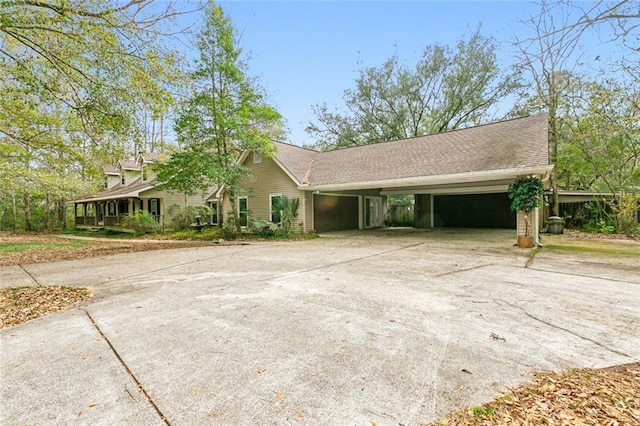 109 Lefleur Dr, Slidell, LA 70460 - view of front facade featuring driveway and a carport