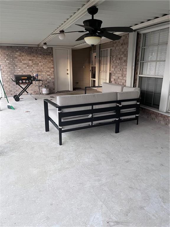 view of patio featuring ceiling fan and outdoor lounge area