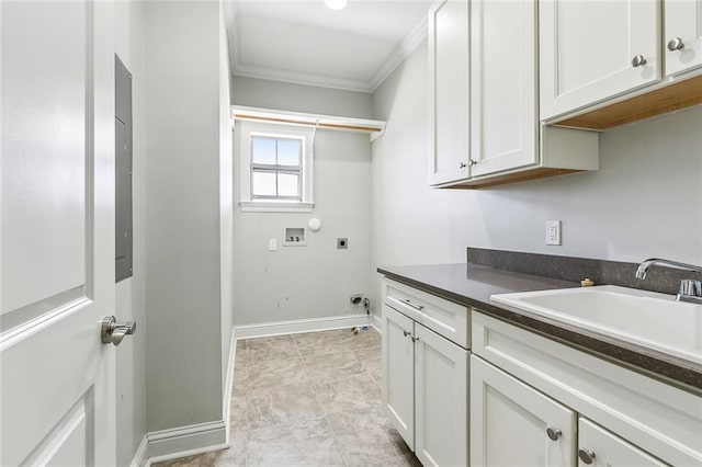 washroom with sink, crown molding, hookup for a washing machine, cabinets, and hookup for an electric dryer