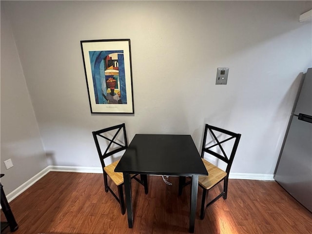 dining area featuring hardwood / wood-style flooring