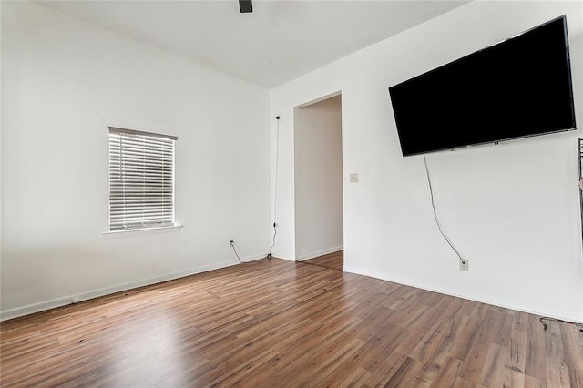 spare room with hardwood / wood-style flooring