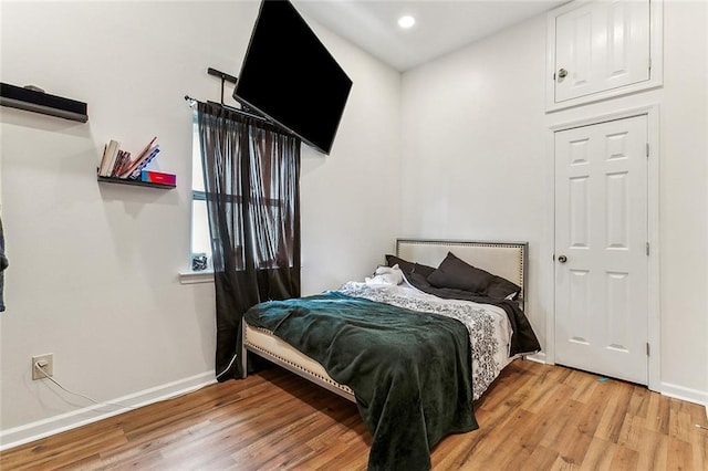 bedroom featuring light hardwood / wood-style flooring