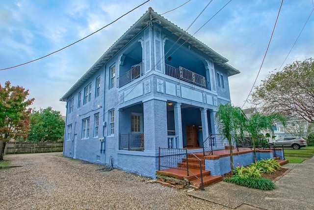 view of property exterior with a balcony