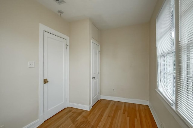 unfurnished bedroom with light hardwood / wood-style flooring