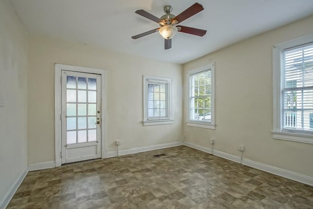 entryway featuring ceiling fan