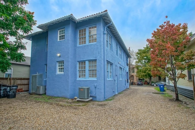 view of home's exterior featuring central air condition unit