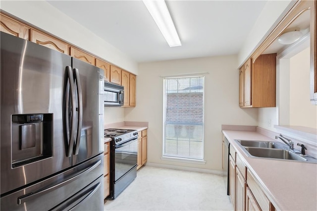 kitchen featuring sink and black appliances