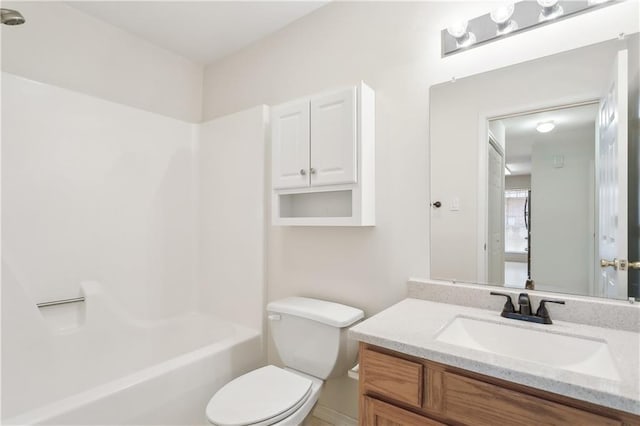 full bathroom with vanity, shower / washtub combination, and toilet