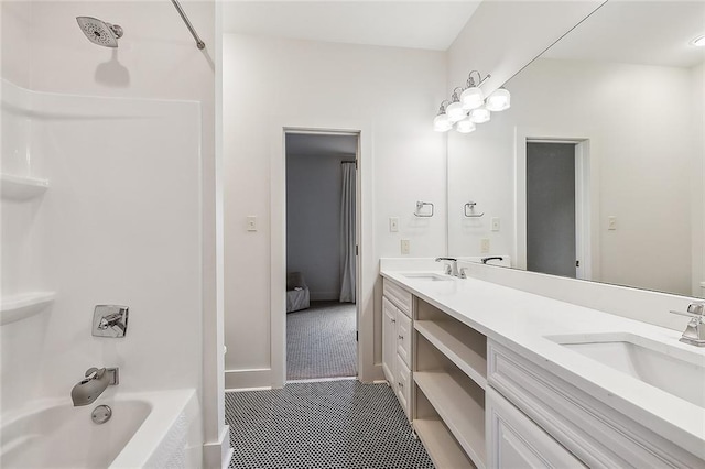 bathroom featuring shower / tub combination, vanity, and tile patterned floors