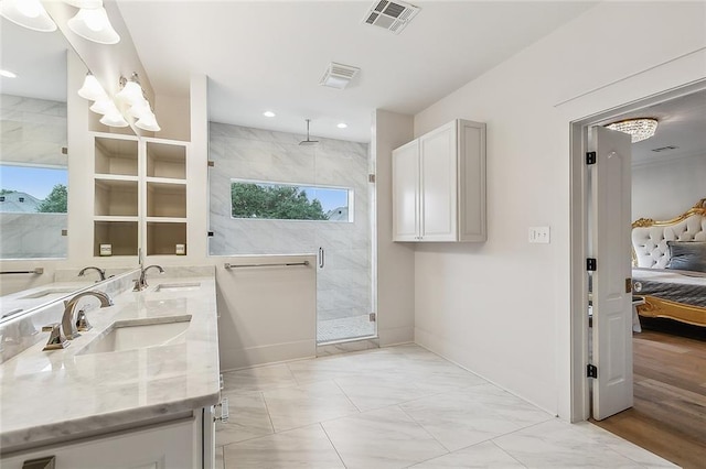 bathroom with vanity and an enclosed shower