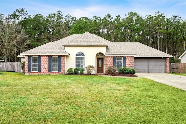 ranch-style house with a garage and a front lawn