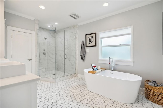 bathroom with sink, crown molding, and shower with separate bathtub