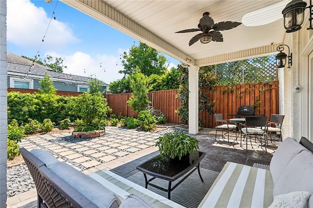 view of patio / terrace with ceiling fan and outdoor lounge area