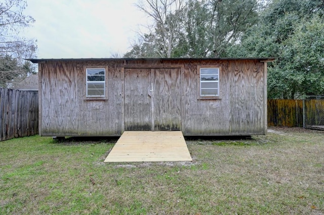 view of outdoor structure with a yard