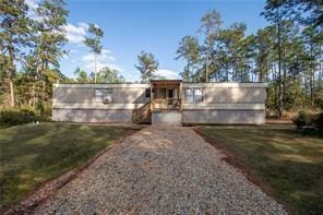 view of front of home with a front lawn