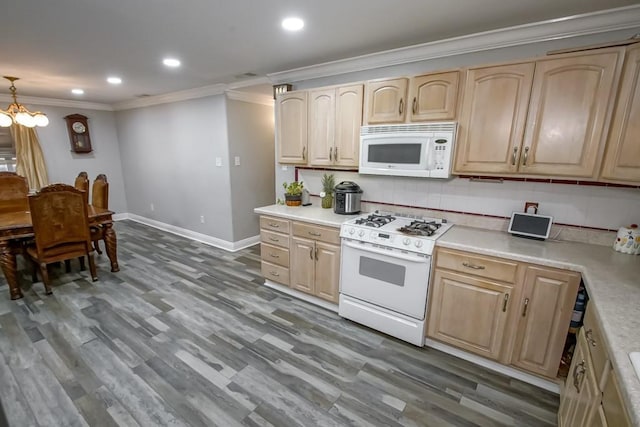 kitchen with dark hardwood / wood-style floors, light brown cabinetry, decorative backsplash, crown molding, and white appliances