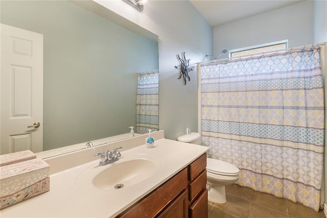 bathroom with walk in shower, tile patterned floors, toilet, and vanity