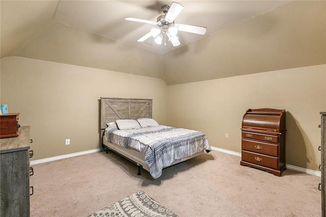 carpeted bedroom featuring lofted ceiling and ceiling fan