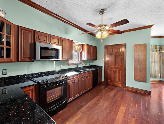 kitchen with ornamental molding, sink, a textured ceiling, and black appliances