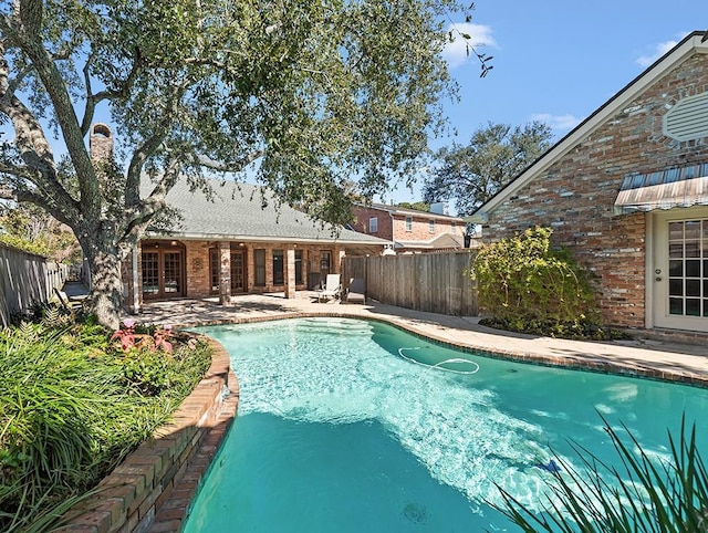 view of pool with a patio area