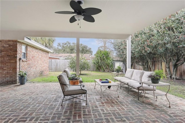 view of patio featuring an outdoor living space and ceiling fan