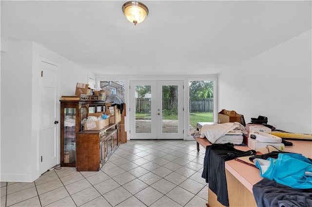 interior space with access to outside and french doors