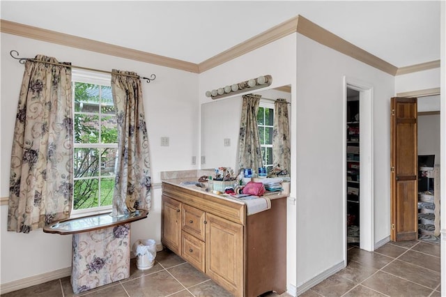 bathroom with vanity, tile patterned flooring, and crown molding