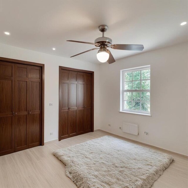 hall with vaulted ceiling