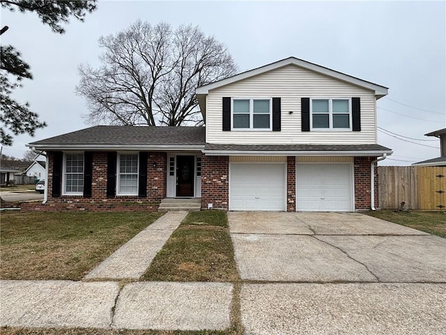 view of front facade featuring a garage and a front yard