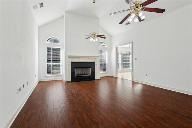 unfurnished living room featuring wood-type flooring, high vaulted ceiling, and ceiling fan