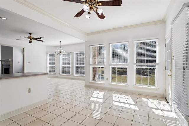 unfurnished living room featuring ceiling fan with notable chandelier, ornamental molding, and light tile patterned flooring