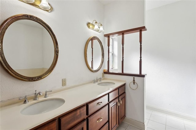 bathroom with vanity and tile patterned floors