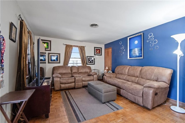 living room with parquet flooring