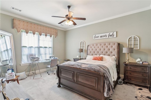 carpeted bedroom with crown molding and ceiling fan