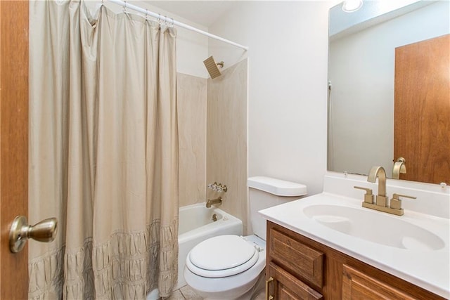 full bathroom with vanity, shower / bath combo, and toilet