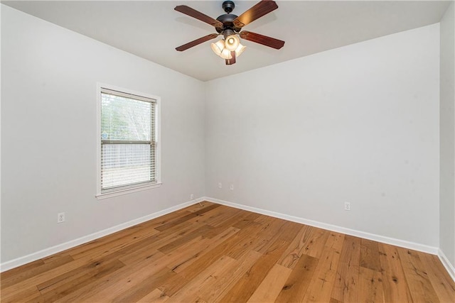 unfurnished room featuring ceiling fan and light hardwood / wood-style flooring