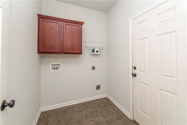 laundry room with cabinets, hookup for a washing machine, and hookup for an electric dryer