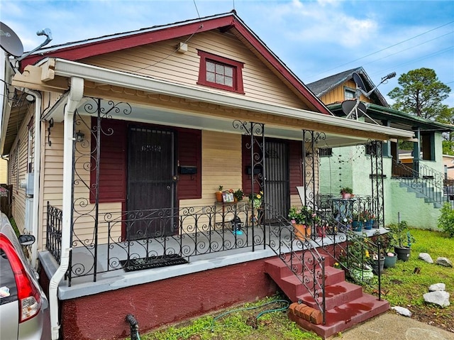 bungalow featuring covered porch