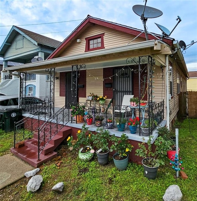 bungalow-style house featuring covered porch