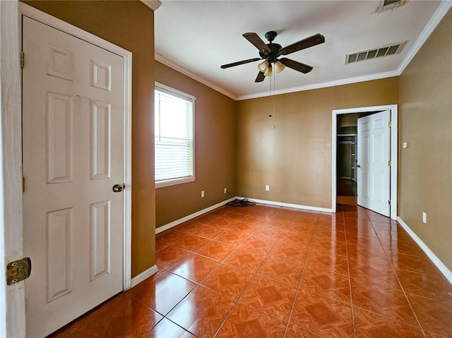 unfurnished bedroom featuring crown molding, ceiling fan, and tile patterned floors