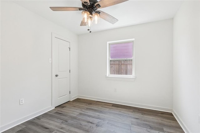 unfurnished room with ceiling fan and hardwood / wood-style floors