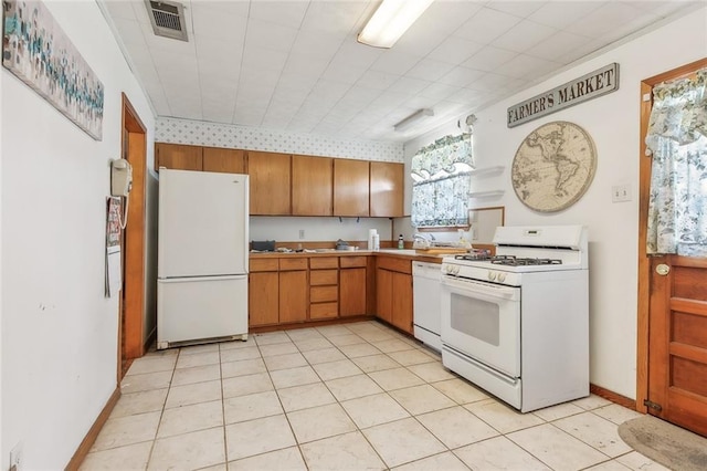 kitchen featuring white appliances